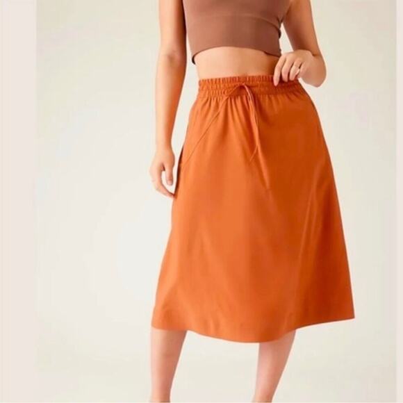 Athleta Arrival Skirt Orange Knee-Length Lightweight Pockets Size 22 - Picture 1 of 9